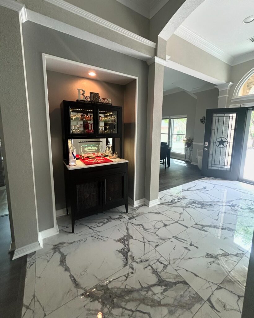 New remodeled entryway with large format tile